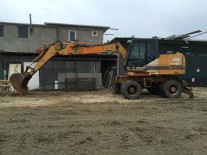 Inchiriere excavator pe pneuri