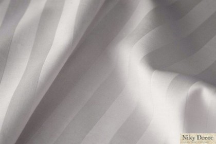 Cum poti amenaja camera unei pensiuni cu materiale textile de calitate